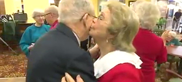 image of a resident couple of Waterford Barrie Retirement Resident enjoying a dance in the celebration of their 70+ years of love