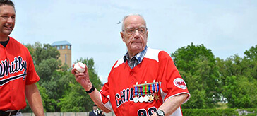 image of Kenneth threw the opening pitch in the Baseball Oshawa Military Appreciation Week game