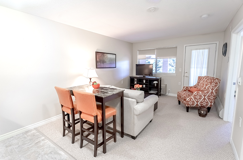 One of the suites in orange theme at Masonville Manor Retirement Residence in London