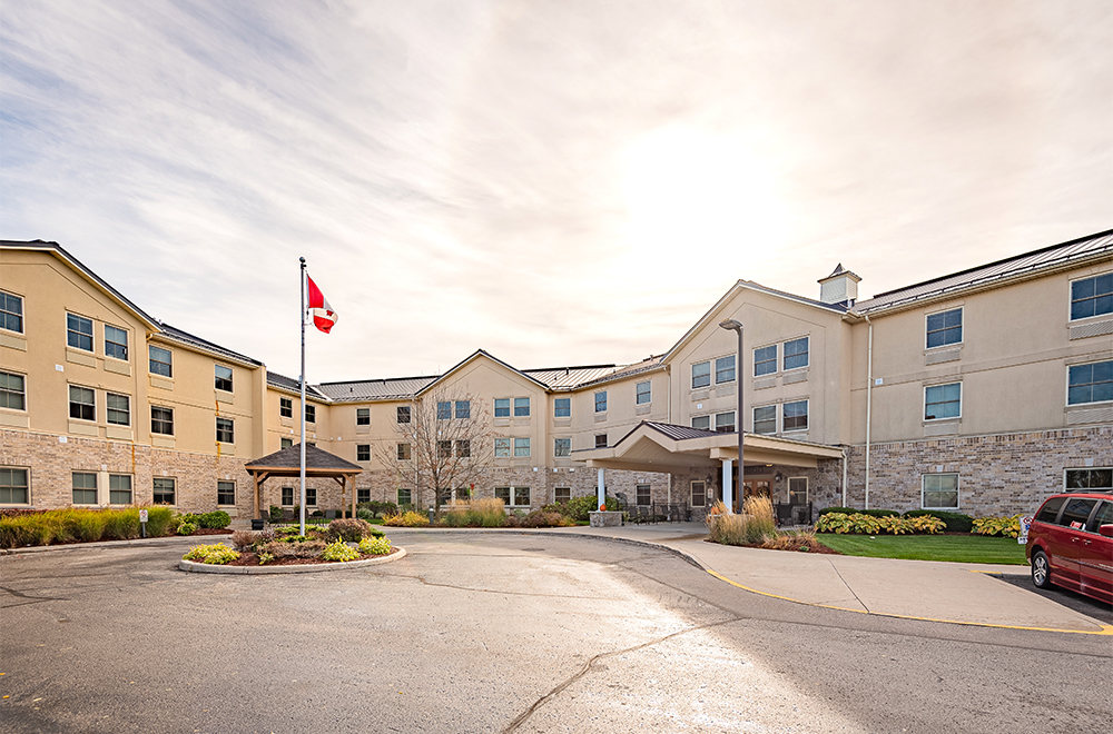 Exterior view of the front entrance at Doon Village Retirement Residence in Kitchener