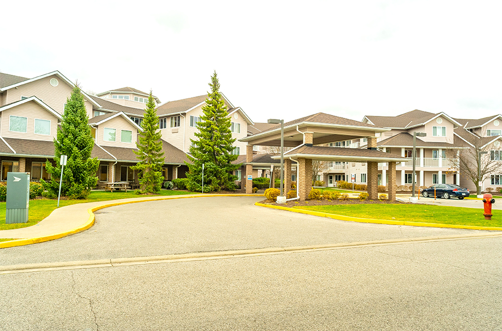 Exterior view of the front entrance at Fairwinds Lodge Retirement Residence in Sarnia