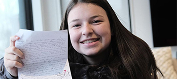 Aryelle Sigulim, now 14,along with her parents, started a program to connect seniors and students through letters during the isolation of the pandemic. Photo credit:thestar.com