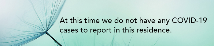 image of a dandelion with a message saying At this time we do not have any COVID-19 cases to report in this residence.