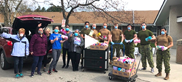 group photo of volunteers delivered 82 hand-sewn quits as Mother's Day gifts to Altamont Care Community