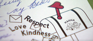 close-up of the Manna's pen pal program logo