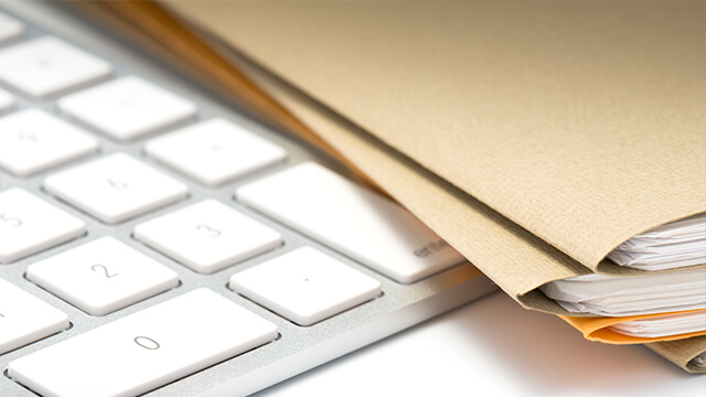image of keypad and papers paperwork.