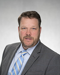 image of Adam Walsh – Senior Vice President and General Counsel