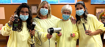 Diane Toth, lifestyles consultant, Bette Hutchinson, retirement counsellor, current resident Mary Bucholtz and Amrit Sidhu, director of wellness washed, dried and styled hair at Peninsula.