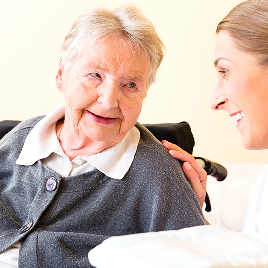 image of a happy female senior sitting in a relaxing area