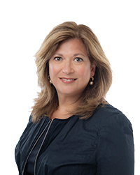 headshot of Olga Giovanni - Executive Vice President, People and Culture