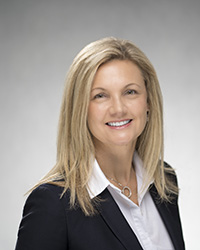 headshot of Olga Giovanni - Executive Vice President, People and Culture