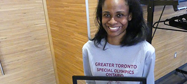 Monique Shah with a painting given to her by BWG council to honour her contributions to Special Olympics.