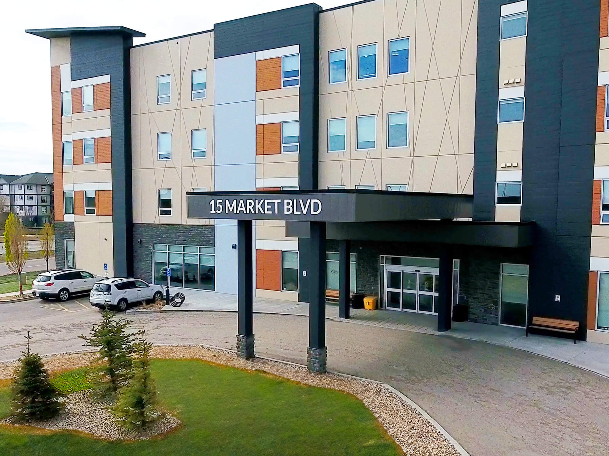image of the front entrance of Brookside Lodge Care Community in Surrey