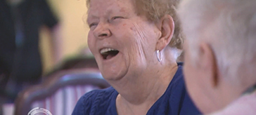 image of a female senior having a good time in her retirement residence
